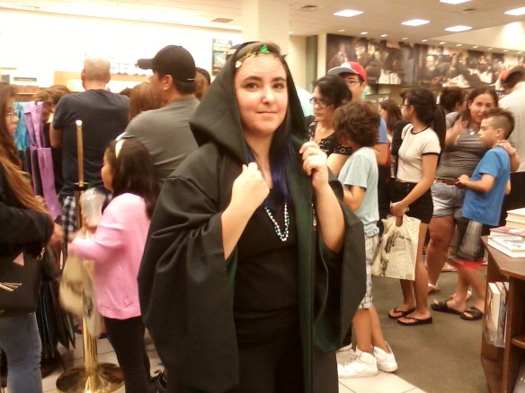 Slytherin staff helping keep queue in order